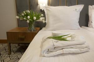 Posteľ alebo postele v izbe v ubytovaní Platinum Residence Boutique