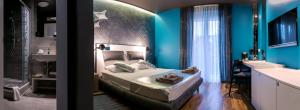 Postel nebo postele na pokoji v ubytování Design B&B Bacvice Arti
