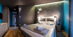 Postel nebo postele na pokoji v ubytování Design B&B Bacvice Arti