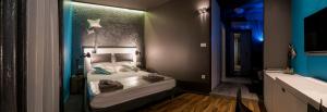 Postel nebo postele na pokoji v ubytování Design B&B Bacvice Arti