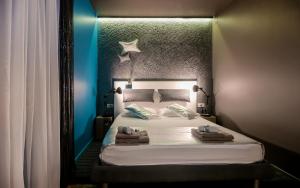Postel nebo postele na pokoji v ubytování Design B&B Bacvice Arti