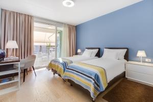 Postel nebo postele na pokoji v ubytování BB Residence + 37 fotografií