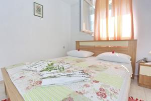 Posteľ alebo postele v izbe v ubytovaní Apartments Romansa