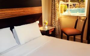 Voodi või voodid majutusasutuse Obelisk Nile Hotel Aswan toas