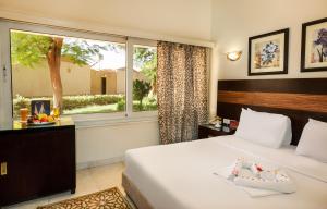 Voodi või voodid majutusasutuse Obelisk Nile Hotel Aswan toas