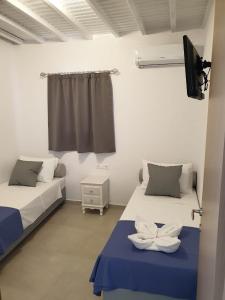 Maya Apartments客房内的一张或多张床位