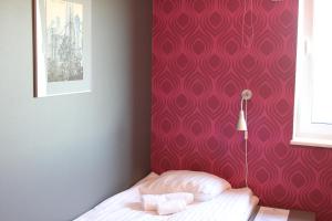 A bed or beds in a room at Tuhamäe Hostel