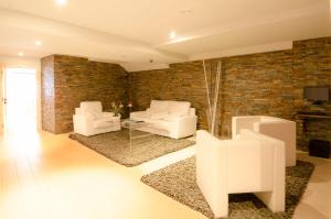 Posezení v ubytování Hotel Arha Potes & Spa
