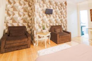 Posezení v ubytování Hotel Arha Potes & Spa
