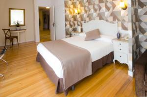 Postel nebo postele na pokoji v ubytování Hotel Arha Potes & Spa