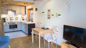 Kuchyň nebo kuchyňský kout v ubytování Ferienhaus Elbtalaue