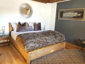 Krevet ili kreveti u jedinici u okviru objekta CHALET BELLE KAISER by Belle Stay
