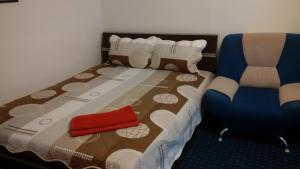 Кровать или кровати в номере Simona Studio