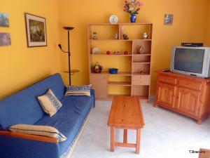 TV a/nebo společenská místnost v ubytování Villa Adriana 306