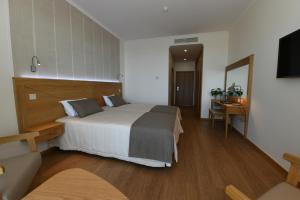 Postel nebo postele na pokoji v ubytování Hotel Do Campo