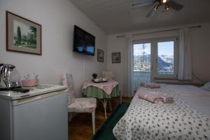 Voodi või voodid majutusasutuse B&B Pletna a Double Lake-View Room toas