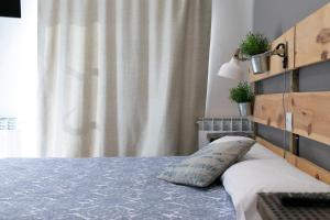 Ένα ή περισσότερα κρεβάτια σε δωμάτιο στο Atuaire Home Gran Vivienda en Centro Histórico San Lorenzo +52 φωτογραφίες