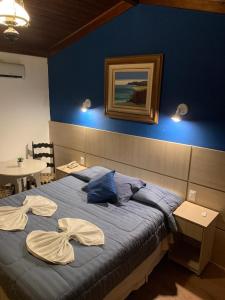 Кровать или кровати в номере Terrazza Hotel