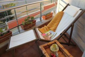 Nápoje v ubytování EXCLUSIVO APARTAMENTO EN SANXENXO CON PISCINA A UNOS 150 m DE LA PLAYA DE SILGAR