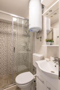Kúpeľňa v ubytovaní S & V Deluxe Apartments