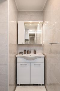Kuchyňa alebo kuchynka v ubytovaní S & V Deluxe Apartments + 22 fotografií