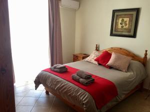 Voodi või voodid majutusasutuse The Heights 2 Bedroom Apartment toas