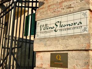 a sign on the side of a building at Villino Eleonora in Parghelia