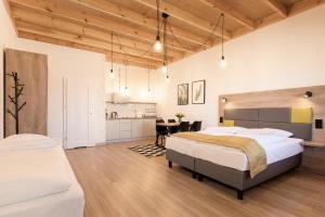 Postel nebo postele na pokoji v ubytování Nowe Sarbinowo