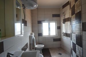 Koupelna v ubytování Apartments Astel