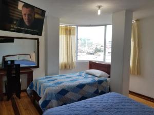 Postel nebo postele na pokoji v ubytování Hotel Ventura