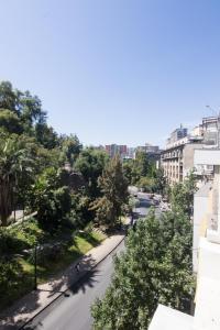 a view of a city street with trees at Hotel Vista Hill in Santiago +44 photos