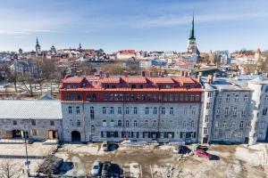 an old building with a city in the background at Orange Apartments Mere in Tallinn