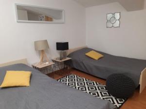 Posteľ alebo postele v izbe v ubytovaní Apartments Villa Holiday