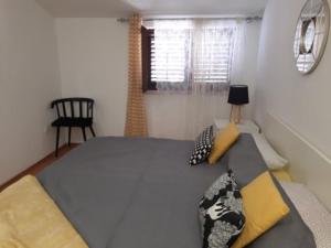 Posteľ alebo postele v izbe v ubytovaní Apartments Villa Holiday