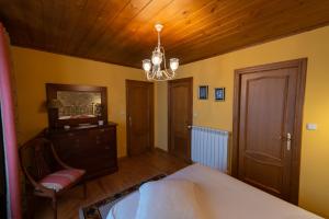 Postel nebo postele na pokoji v ubytování Casa Santiago
