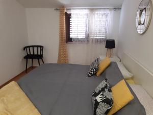 Posteľ alebo postele v izbe v ubytovaní Apartments Villa Holiday
