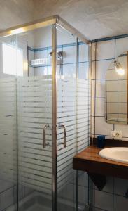 Ванная комната в Apartamentos y Habitaciones Villa Marina