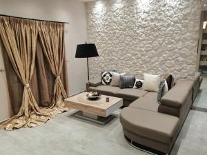 Posezení v ubytování Olive Grove Deluxe apartment