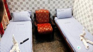 Postel nebo postele na pokoji v ubytování SIU Mansion