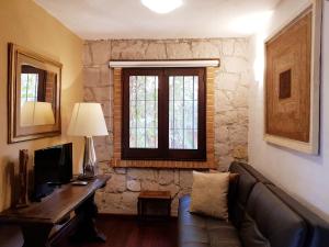 TV a/nebo společenská místnost v ubytování Casa Embrujo Morelia - Boutique