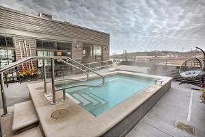 a swimming pool on top of a building at Hotel Crosby in Stillwater