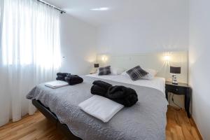 Posteľ alebo postele v izbe v ubytovaní Rooms Andro
