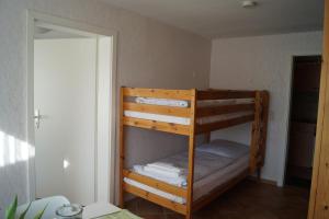Postel nebo postele na pokoji v ubytování Reiterhof Wollesen