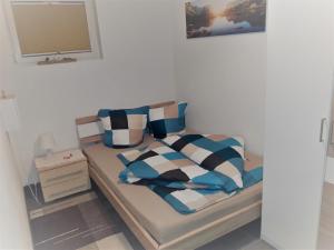 Panorama Apartment tesisinde bir odada yatak veya yataklar