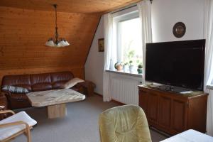 TV a/nebo společenská místnost v ubytování Ferienwohnung Schultze