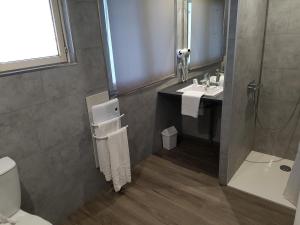 Koupelna v ubytování Hotel Au Spatial