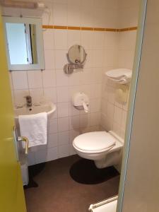 Koupelna v ubytování Hotel Au Spatial