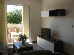 A television and/or entertainment centre at Our Nest Accommodation