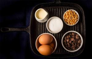 a tray with eggs and other ingredients on a table at The White Lion Hotel in Aldeburgh