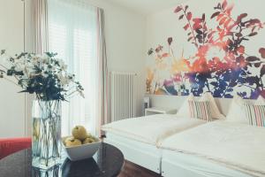 Posteľ alebo postele v izbe v ubytovaní Hotel Tobler
